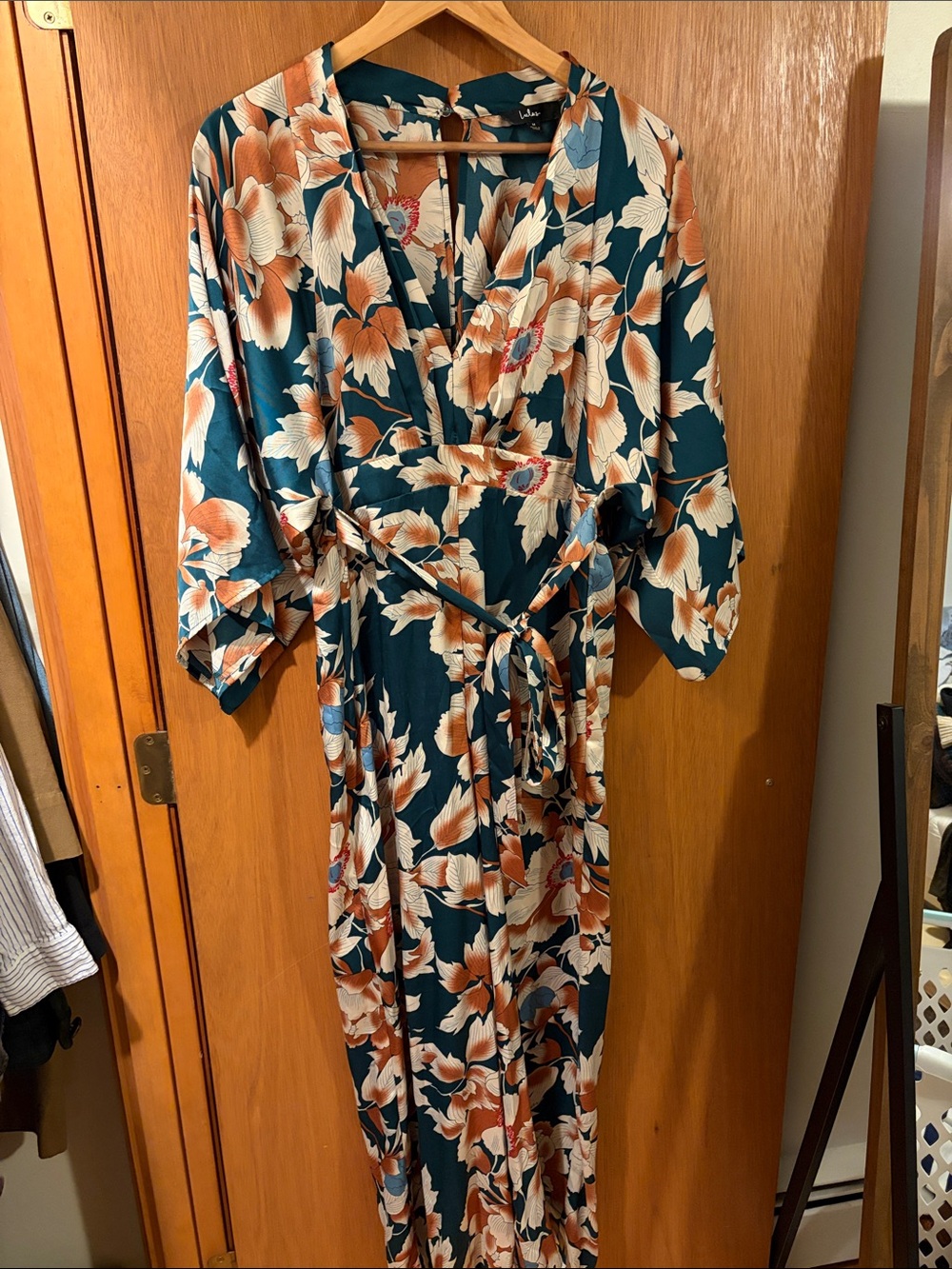 Lulu, size M. Floral Jumpsuit in Teal and Cream